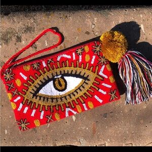 Red Eye Embroidered Clutch with Tassel